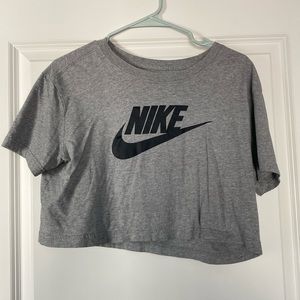 Small, light grey Nike cropped top